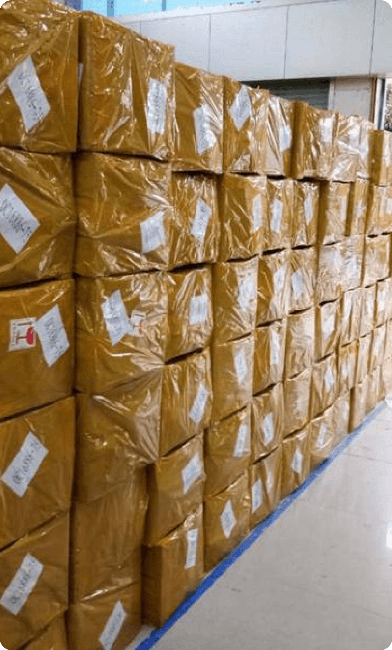 Orange packages stacked